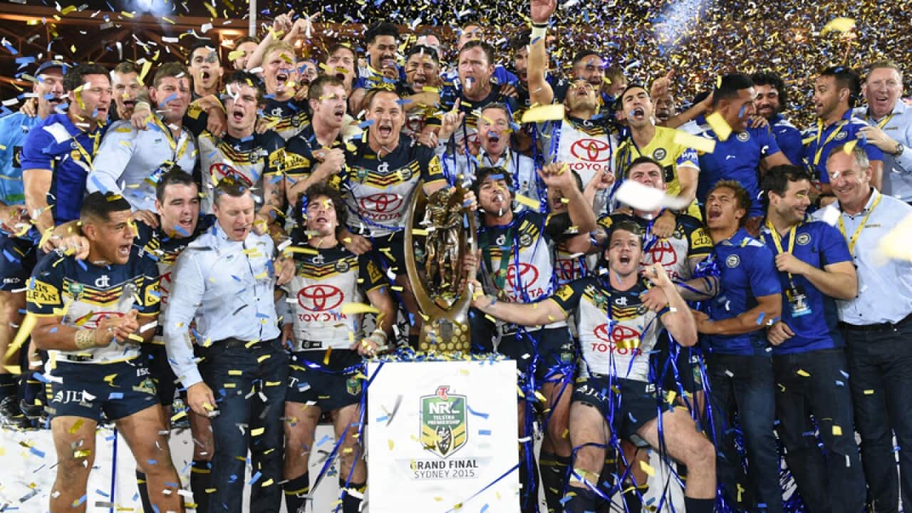 North Queensland Cowboys players with the trophy