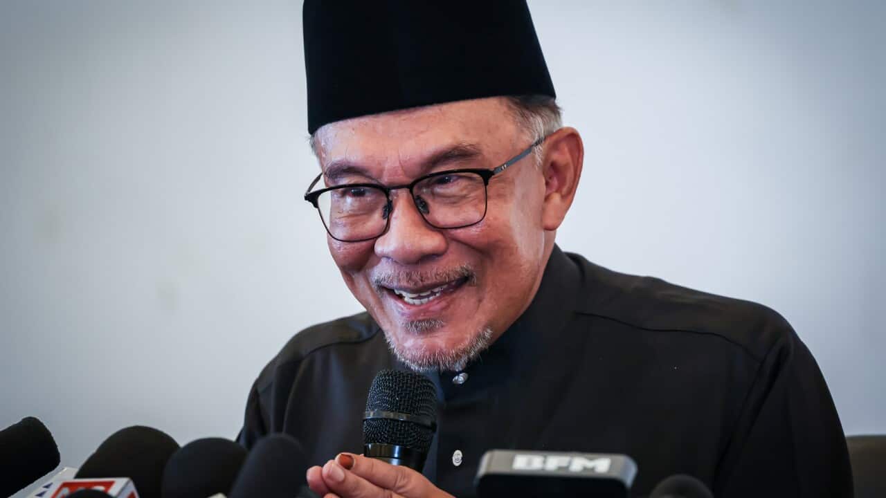 Malaysia's newly appointed Prime Minister Anwar Ibrahim speaks to the media