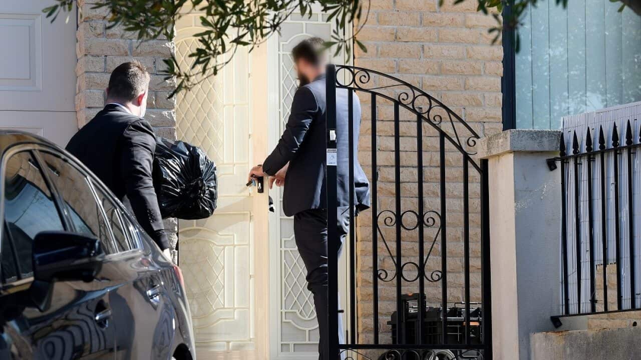 Federal agents enter the home of NSW Labor MP Shaoquett Moselmane in Rockdale, Sydney.