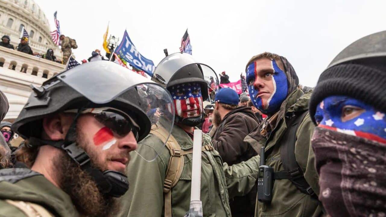 Pro-Trump protesters trying to enter the US Capitol building in Washington, DC, on 6 January, 2021.