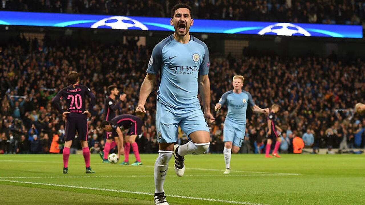 Manchester City's Ilkay Gundogan celebrates scoring against Barcelona