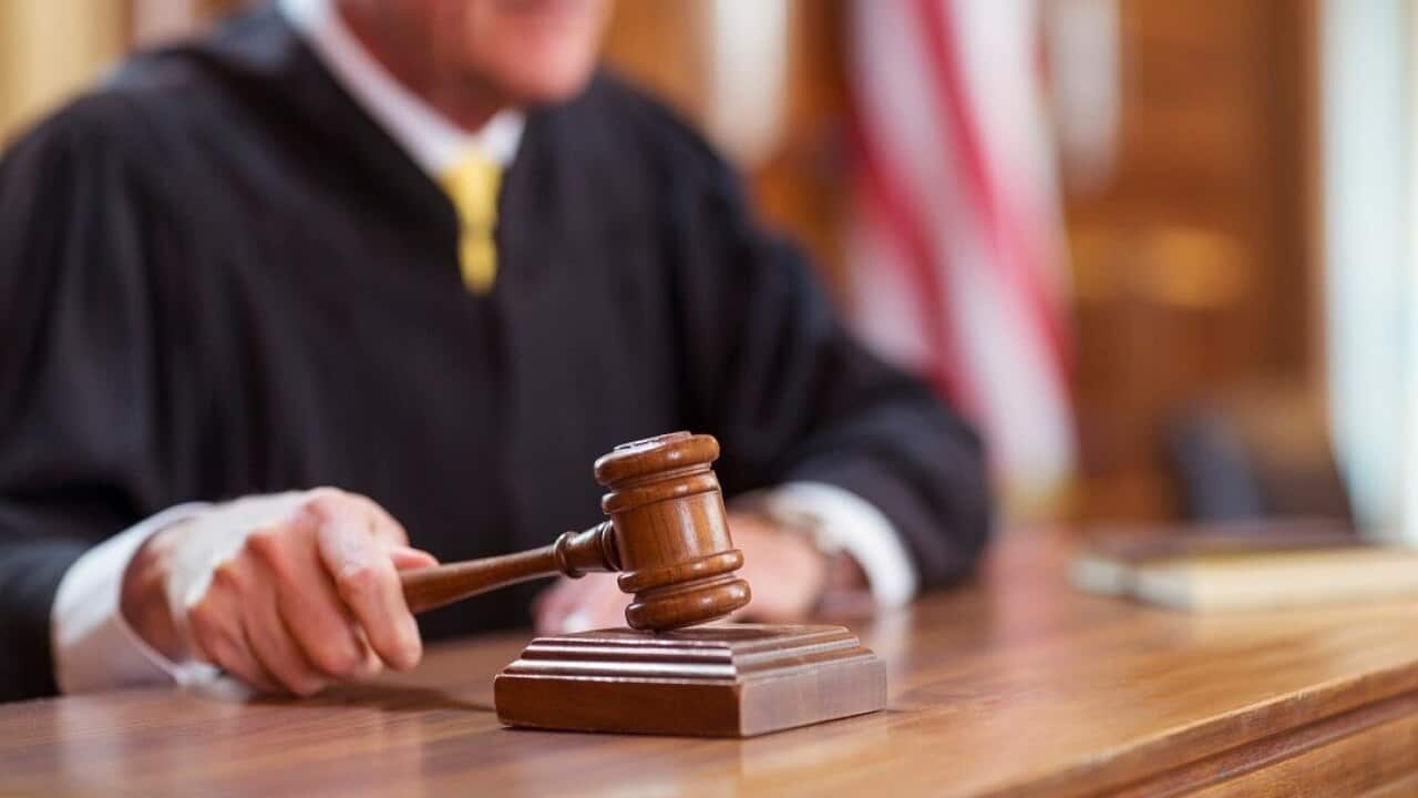 Judge banging gavel in court