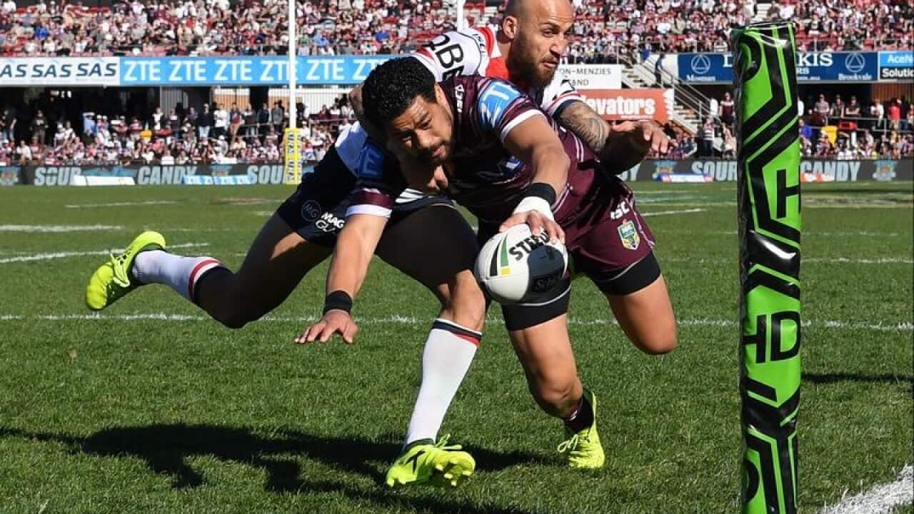 Matthew Wright of the Eagles scores a try