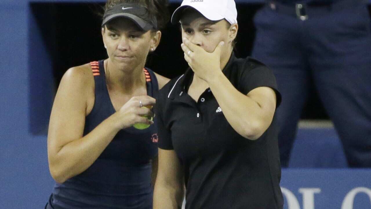 Australian tennis duo Casey Dellacqua and Ashleigh Barty react.
