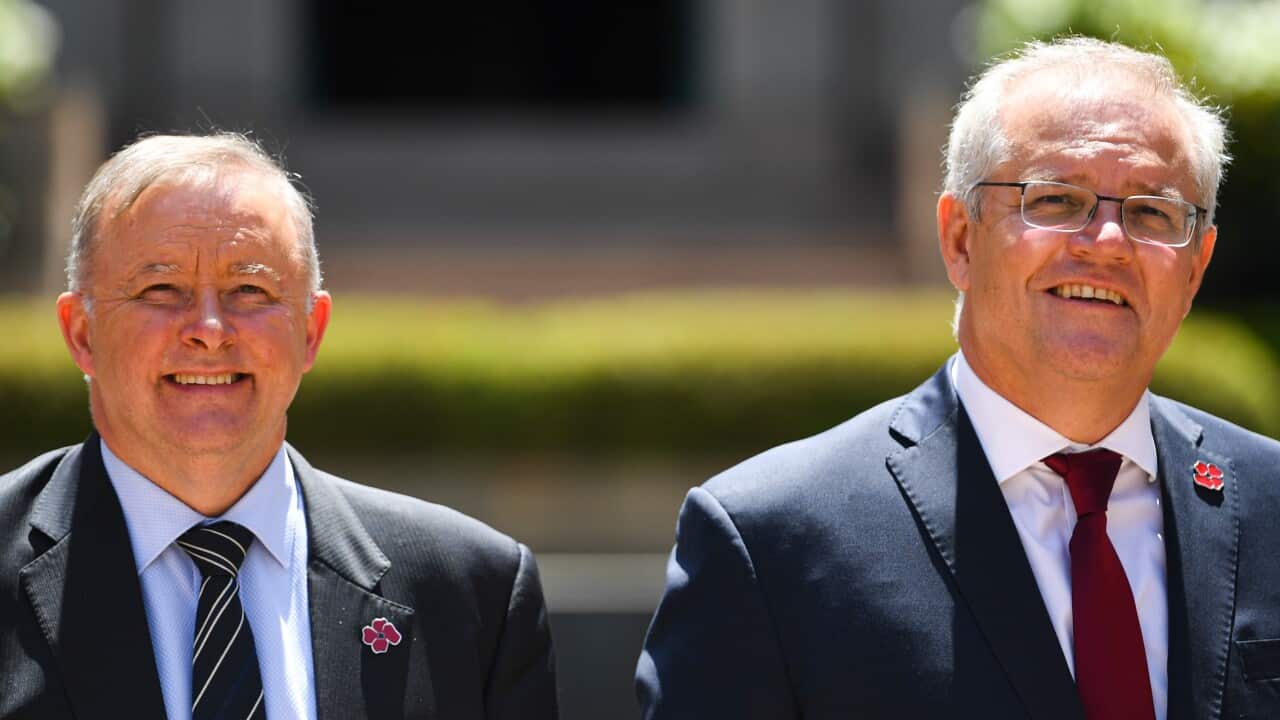 Australian Prime Minister Scott Morrison (right) and Australian Opposition Leader Anthony Albanese