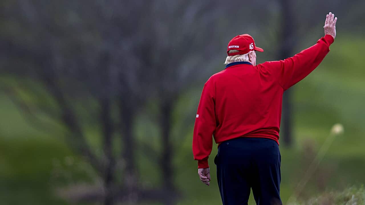 Donald Trump playing golf in November.