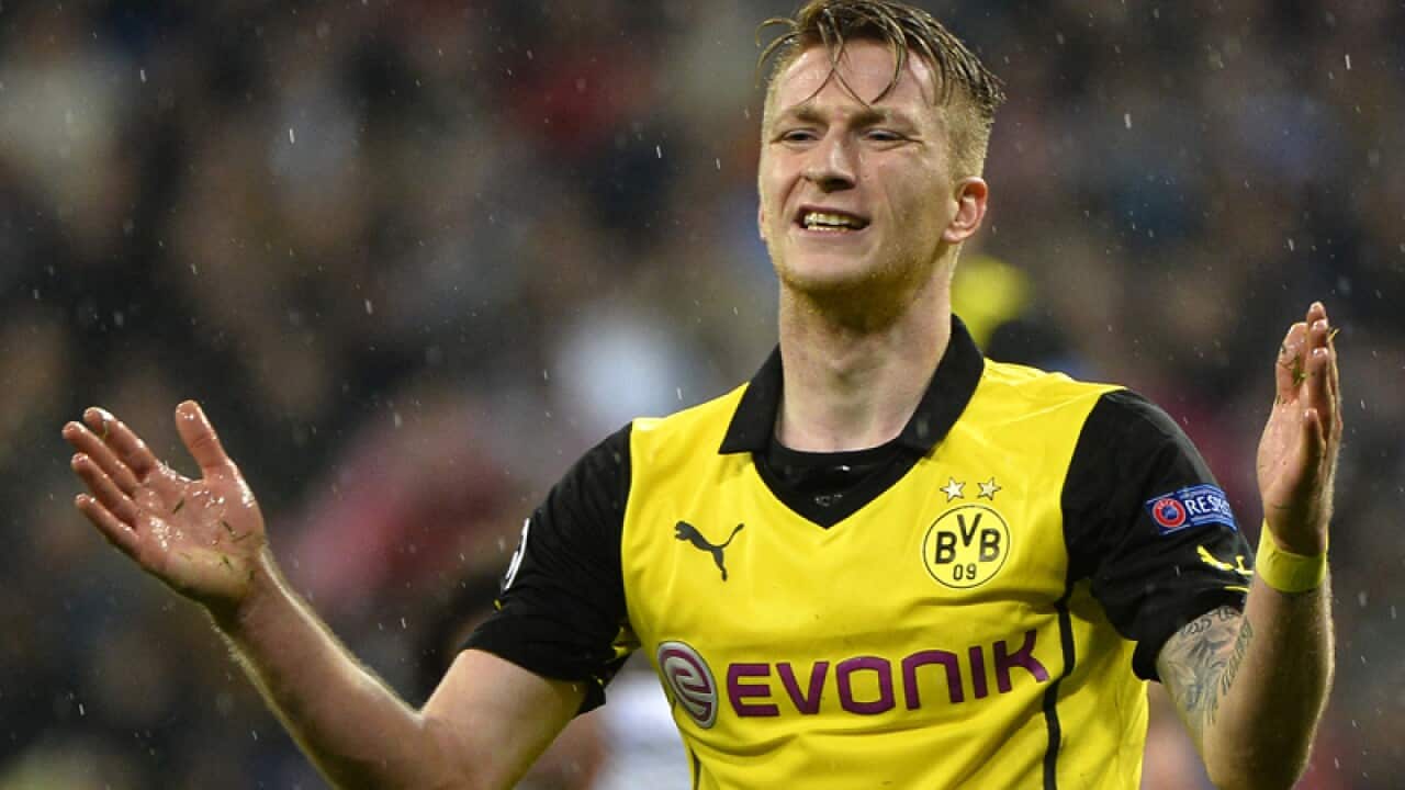 Dortmund's striker Marco Reus reacts