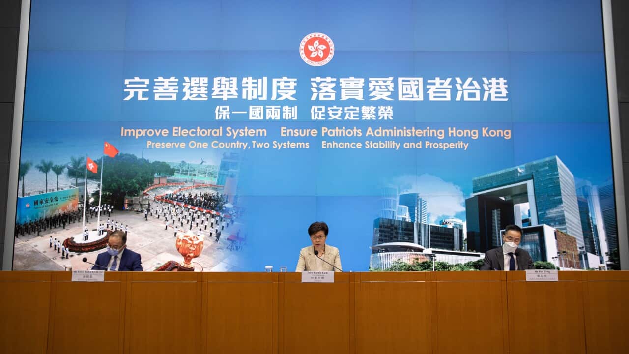 ong Kong Chief Executive Carrie Lam (C) speaks during a press conference about electoral system overhaul in Hong Kong, China, 30 March 2021. China's Standing Committee of the National People's Congress (NPCSC) has approved major changes to the city's elec