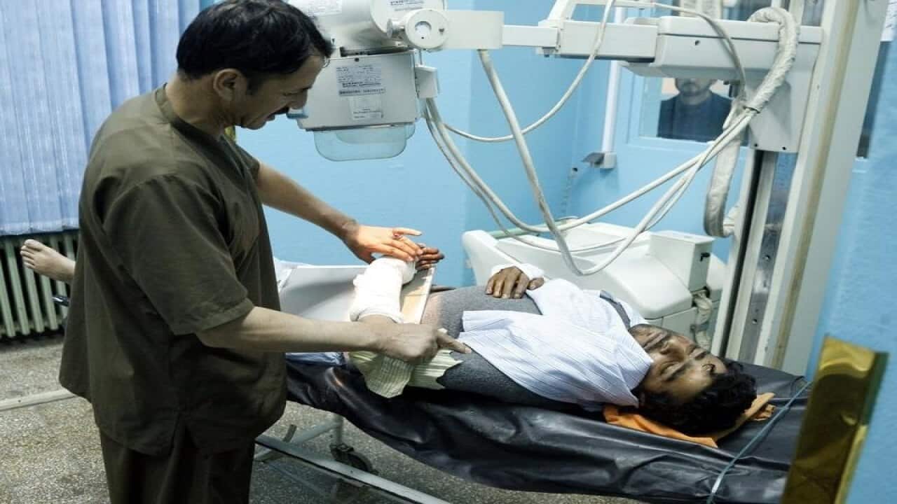 A man injured in the attack is treated at hospital