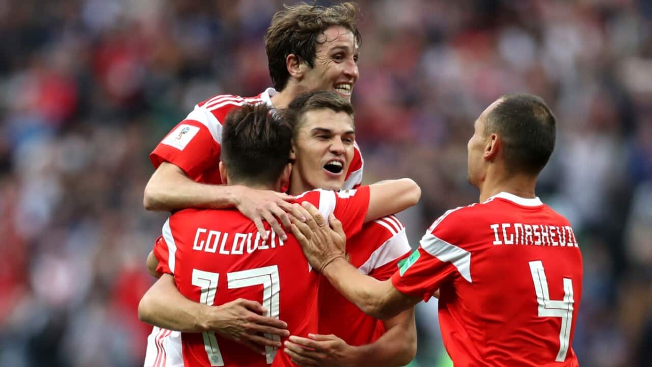 Aleksandr Golovin of Russia celebrates with team mates after scoring his team's fifth goal during the 2018 FIFA World Cup Russia