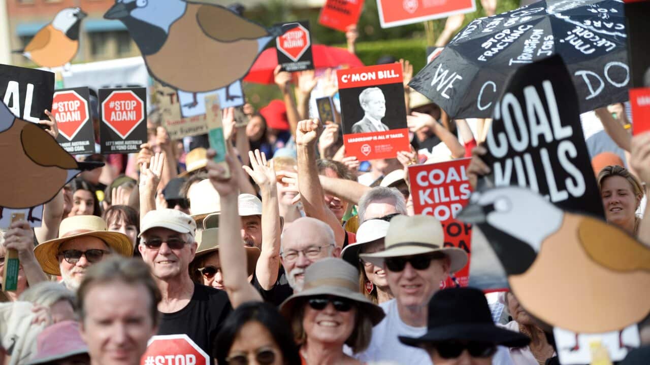 Hundreds of people joined an anti-Adani rally in Sydney as part of a convoy protesting against the Queensland coalmine, Parramatta Park, Sydney, Saturday, April 20, 2019. (AAP Image/Jeremy Piper) NO ARCHIVING