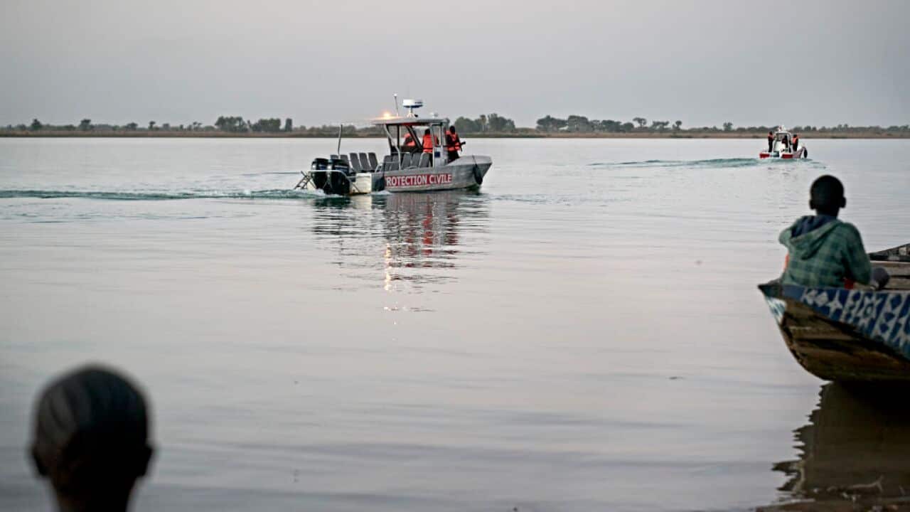 Malian children are seen in February 2020 observing the Niger River, where the boat capsized