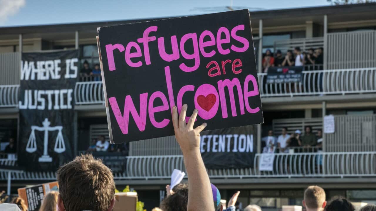 Protesters gather to support asylum seekers detained at the Kangaroo Point Central Hotel in Brisbane.