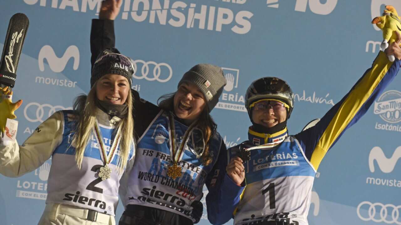 (L-R) Danielle Scott, US Ashley Caldwell, and Chinese Mengtao Xu