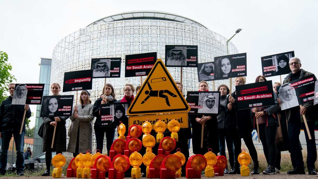 Activists of Reporters Without Borders demonstrate at the embassy of Saudi Arabia in Berlin