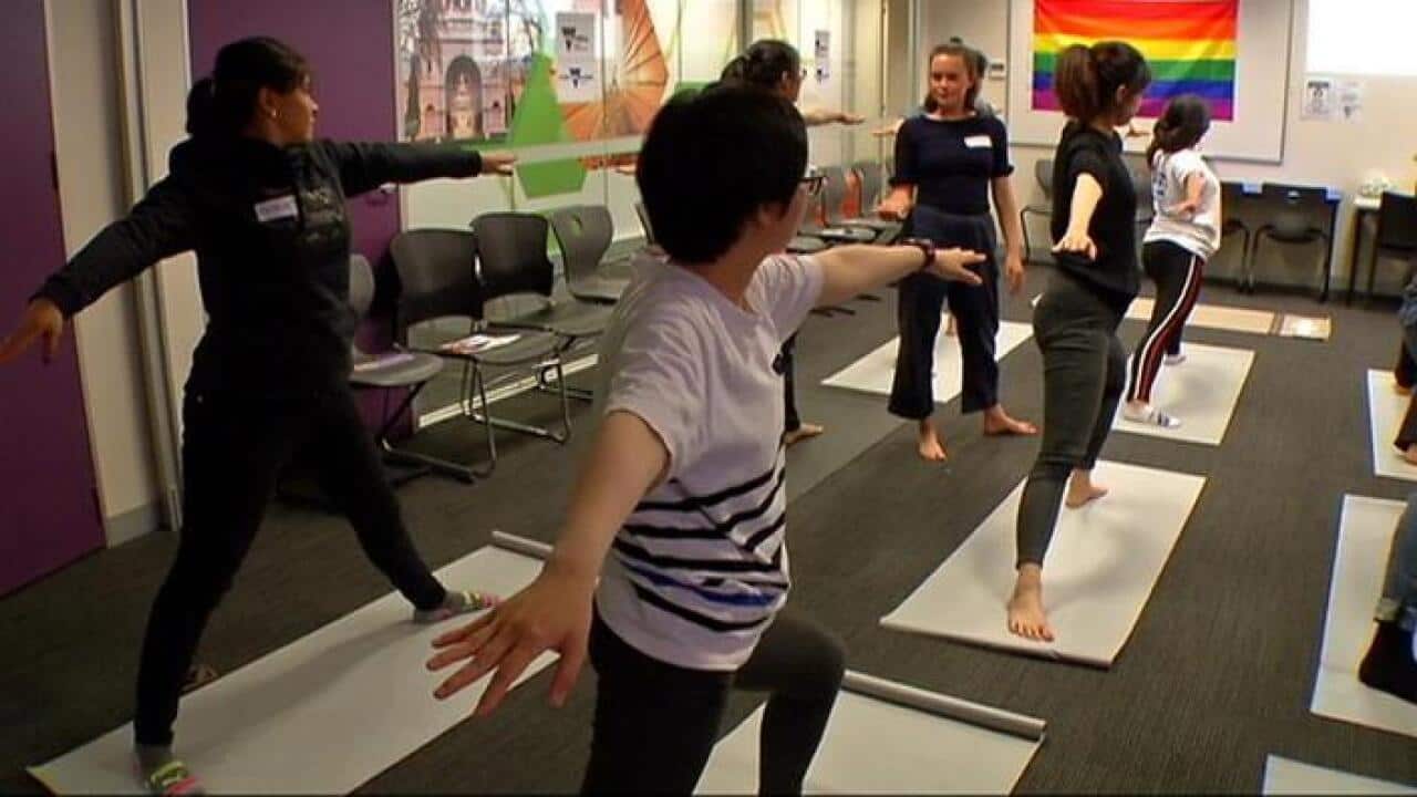 An exercise class at the Rainbow Connection