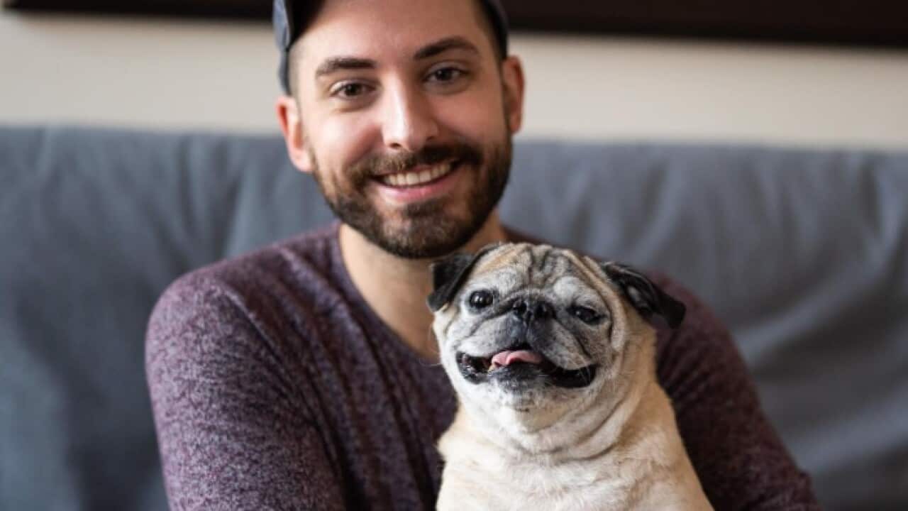 Jonathan Graziano and Noodle the pug.