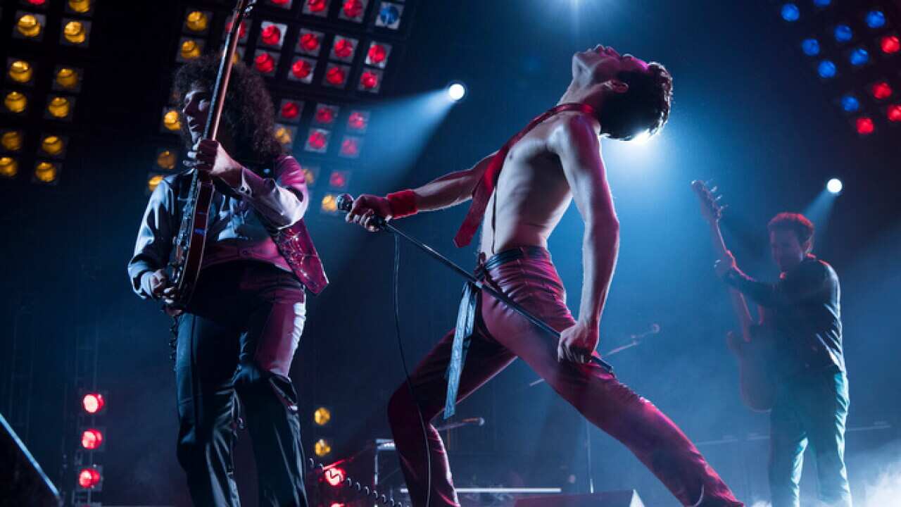 Gwilym Lee, from left, Rami Malek and Joe Mazzello in a scene from "Bohemian Rhapsody." (Alex Bailey/Twentieth Century Fox via AP)