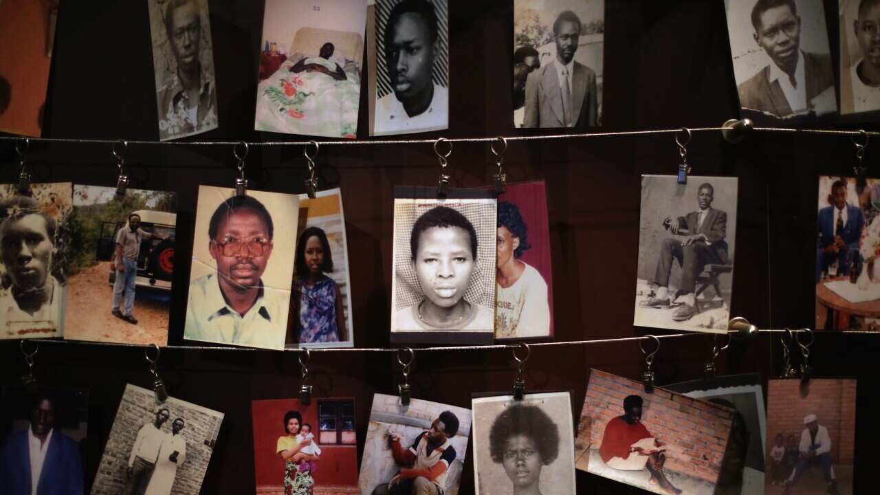 Family photos of some of the victims of the Rwanda genocide in 1994 - Getty-1.jpg