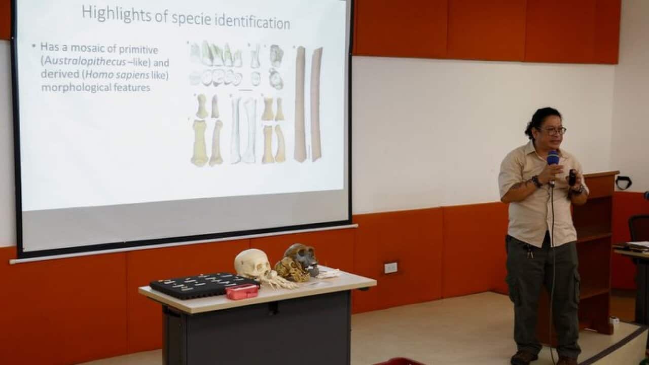 Filipino archeologist Dr. Armand Mijares conducts a presentation on hominin fossils discovered by his team in a cave in the northern Philippines, during a press conference at the University of the Philippines in Quezon City, Philippines, 11 April 2019