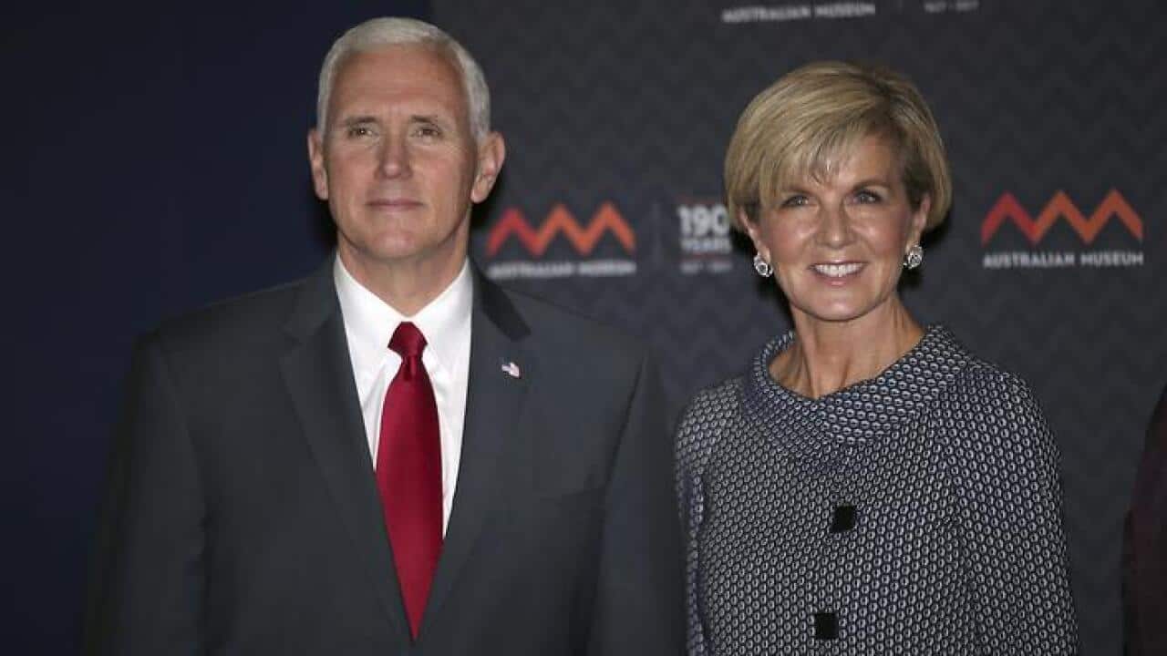 U.S. Vice President Mike Pence, left, and Australian Foreign Minister Julie Bishop pose for a photo during a visit to the Australian Museum in Sydney, Saturday, April 22, 2017. (David Moir/Pool via AP)