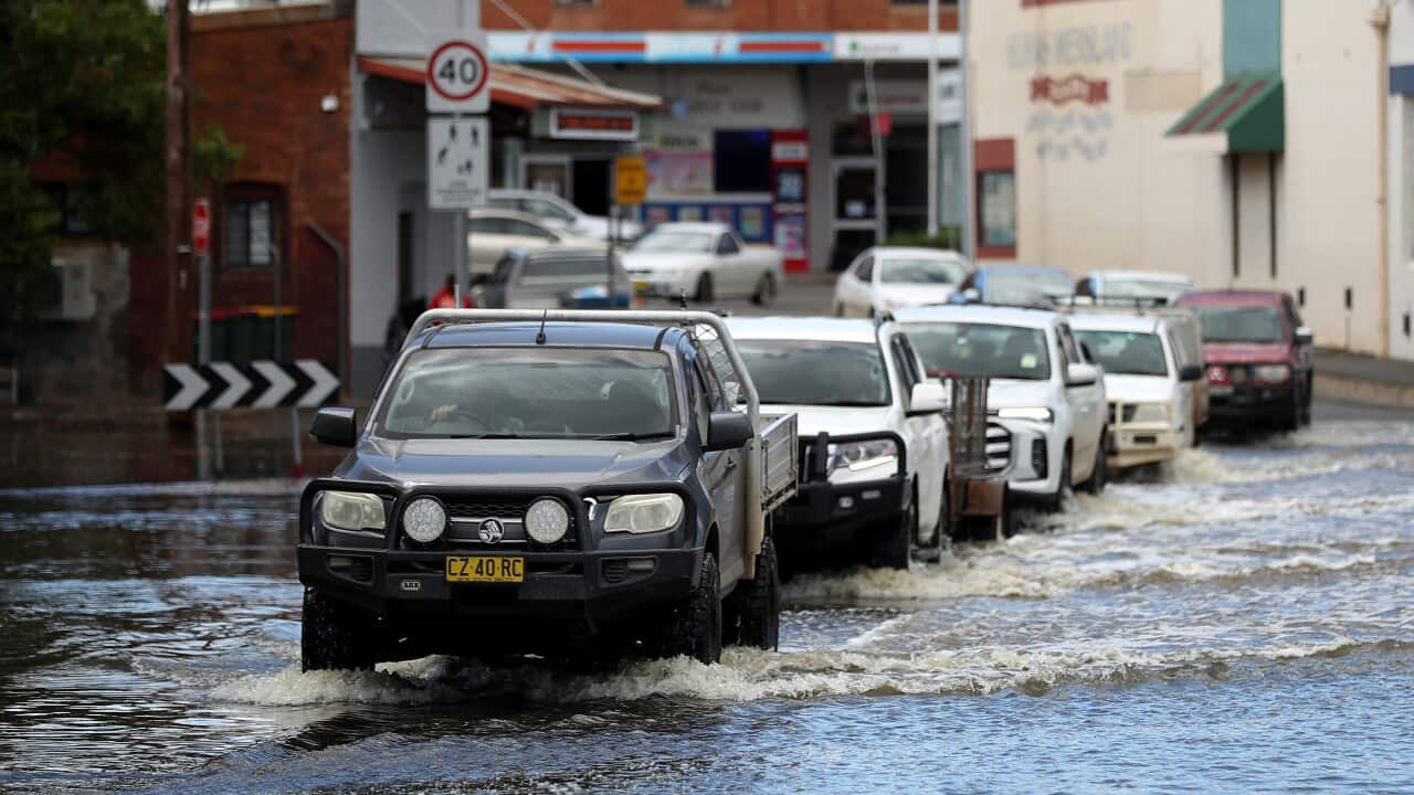 Cras drive through floodwaters