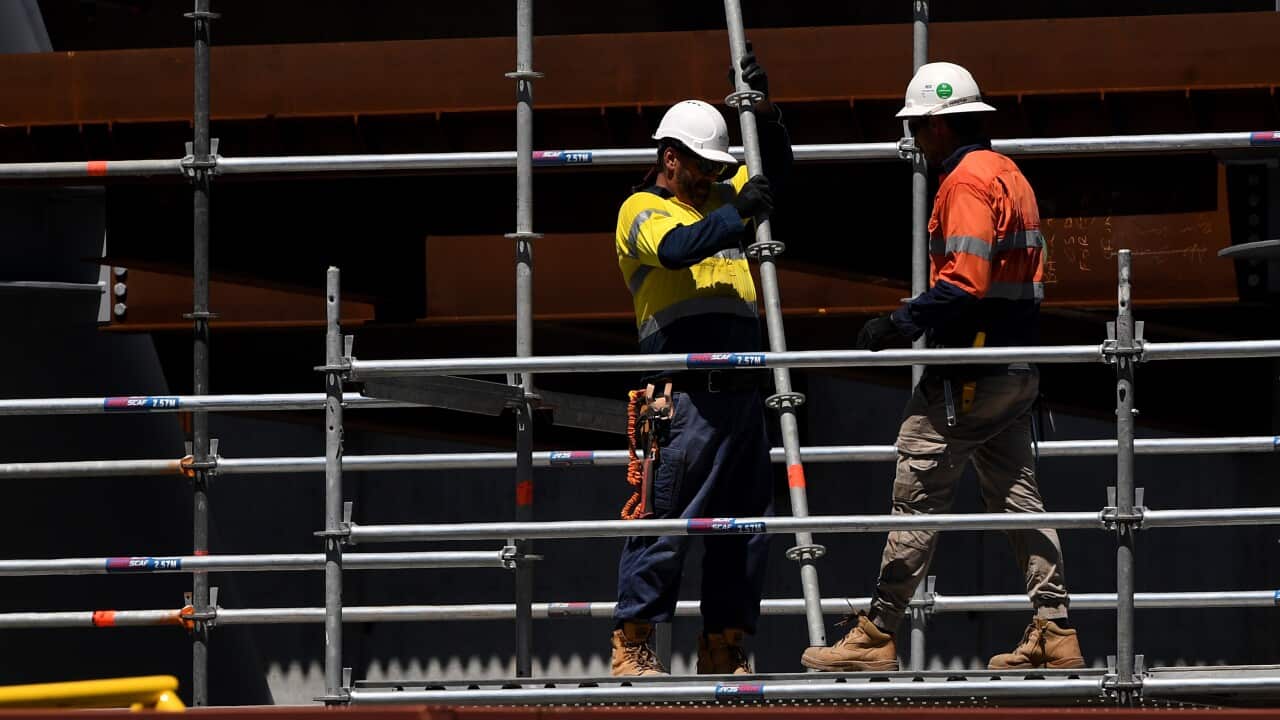Workers seen at a construction site in Sydney in 2019