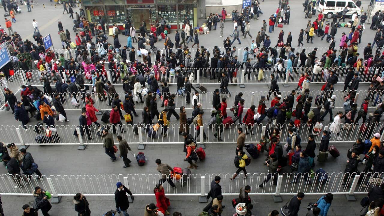 Passengers at the Beijing West Railway Station. Its been