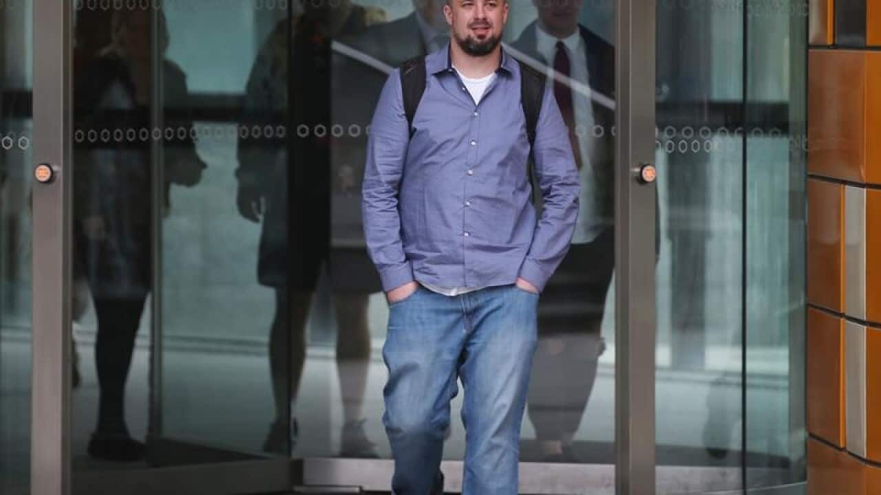 Far-right activist Neil Erikson leaves the Federal Court in Melbourne
