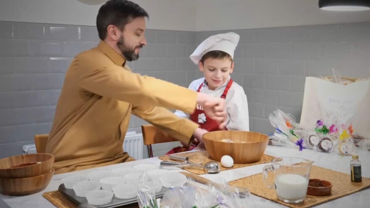 Dan Harris and his son prepare a batch of cupcakes