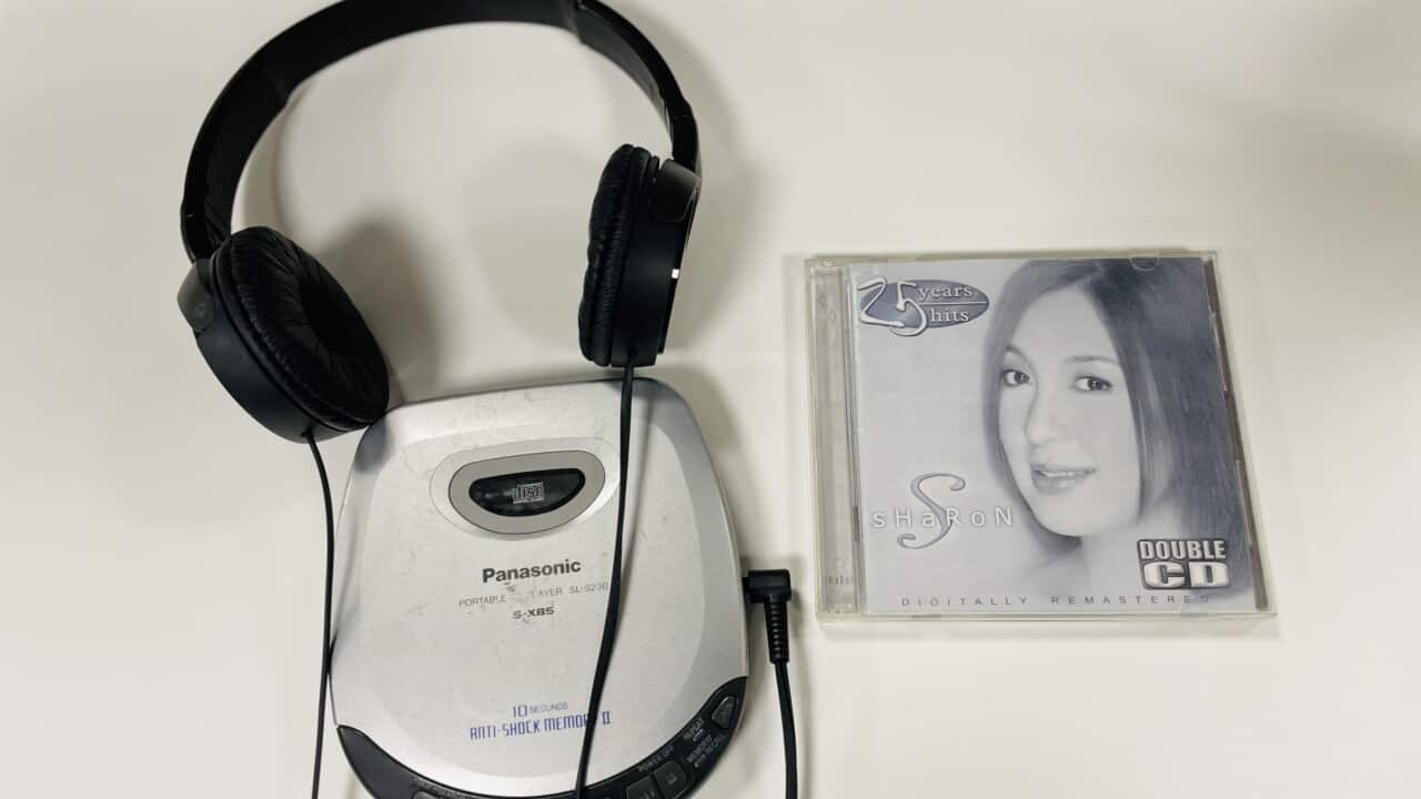 Playing Sharon Cuneta songs on a discman