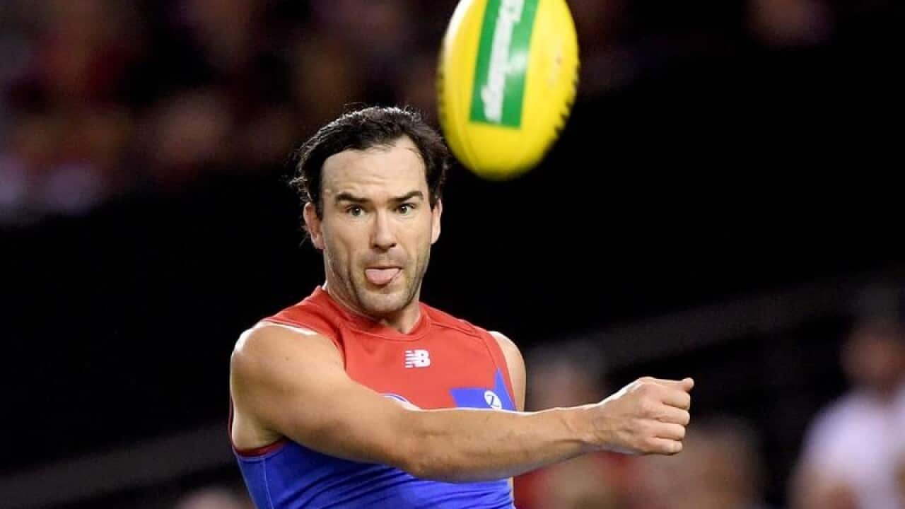 Jordan Lewis of the Demons in action