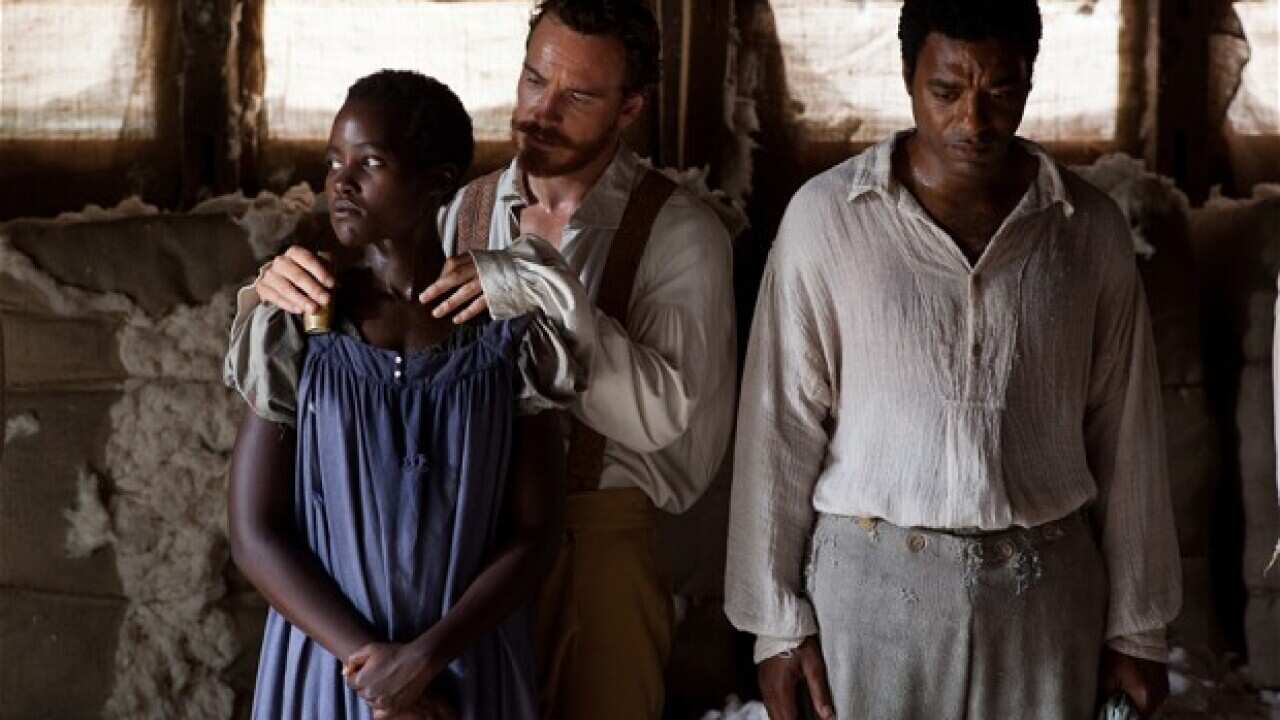 Lupita Nyong’o, from left, Michael Fassbender and Chiwetel Ejiofor in a scene from "12 Years A Slave." (Fox Searchlight/AAP)