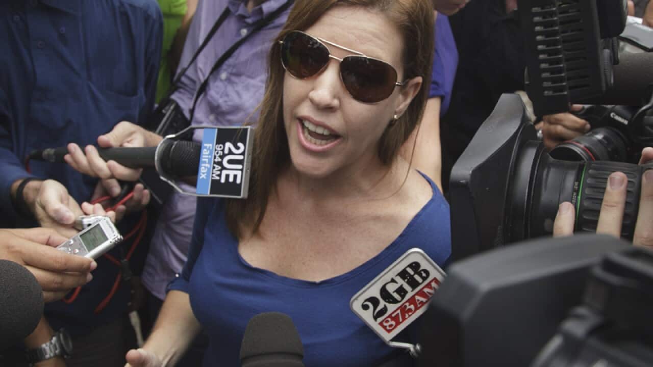 Mercedes Corby gives a statement to the media