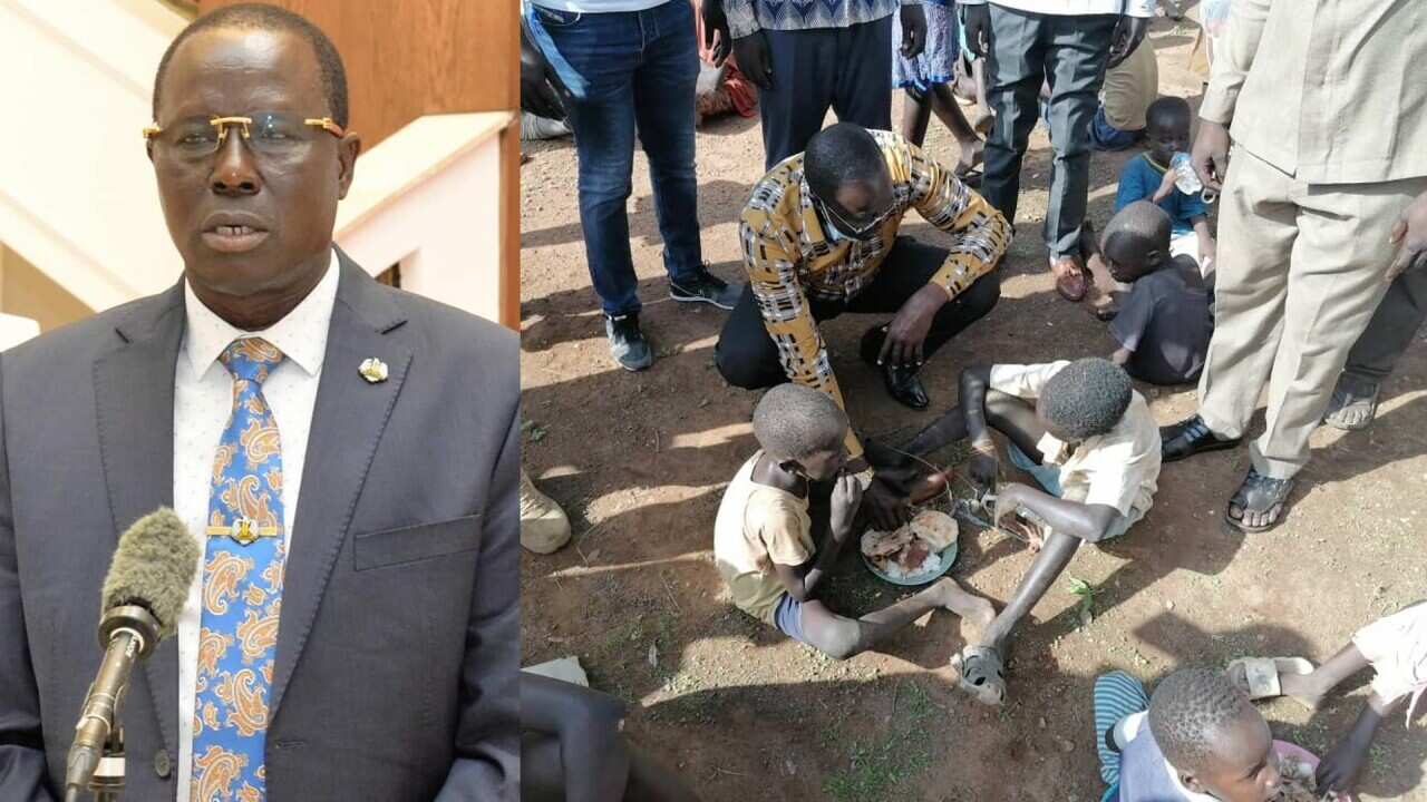 The image of Governor Tong Akeen with homeless children in Aweil.