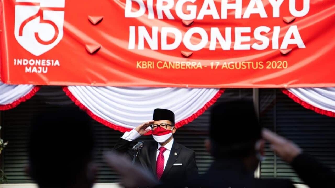 Ambassador Drs Yohanes Kristiarto Soeryo Legowo saluts the flag during the flag raising ceremony in Canberra, 17 Aug 2020.