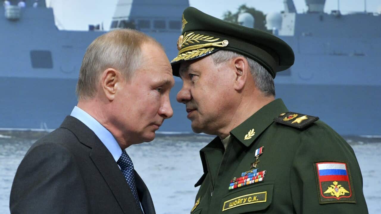 Russian President Vladimir Putin, left, and Russian Defense Minister Sergei Shoigu during a visit a shipyard in St. Petersburg, Russia.