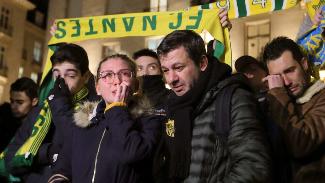 Supporters of FC Nantes gather to pay tribute to Argentinian soccer player Emiliano Sala, in Nantes, western France, Tuesday, Jan. 22, 2018 (AAP)