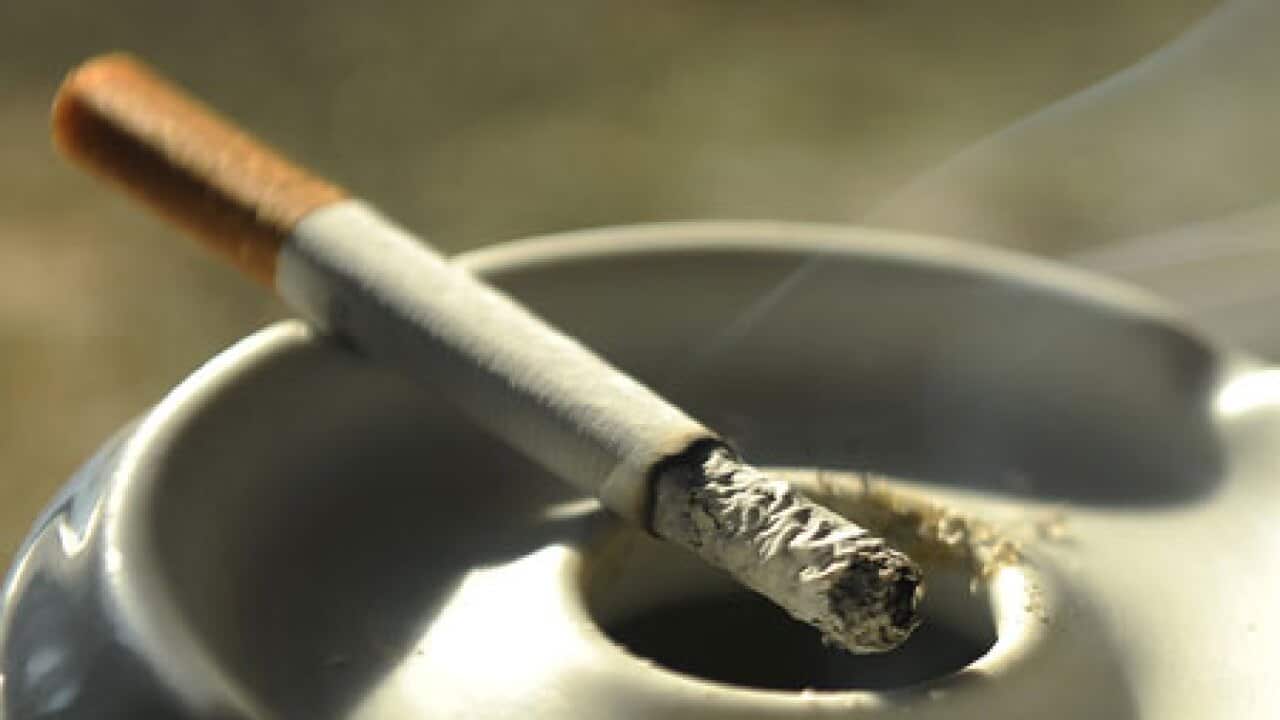 smoking_cigarette_092812_b_g_2123425869