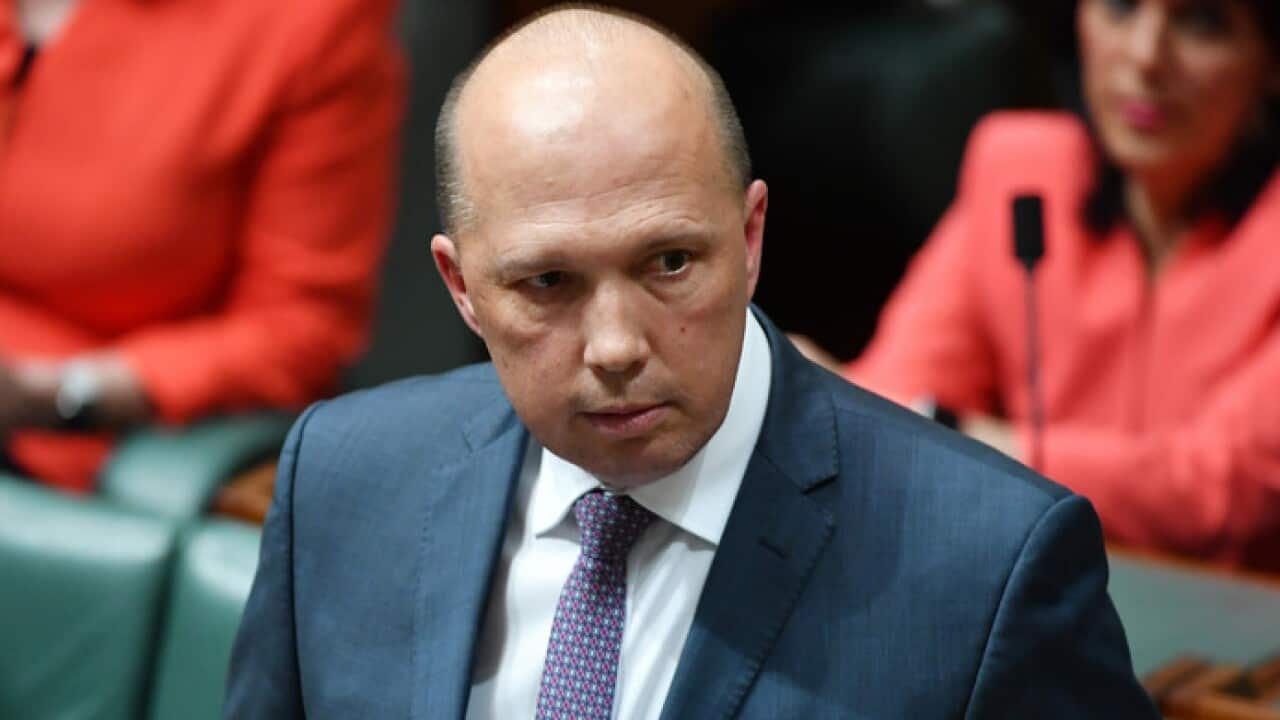 Minister for Immigration Peter Dutton during Question Time in the House of Representatives at Parliament House in Canberra.