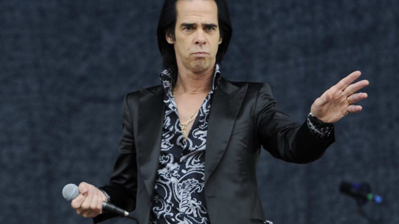 Nick Cave performs during a concert at Glastonbury Festival
