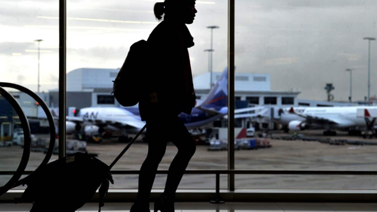 Stock photo of a tourist at Sydney Airport