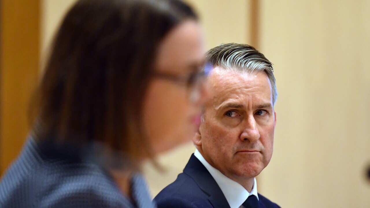 Department of Social Services deputy secretary Matthew Flavel has denied newly arrived migrants will be left to 'fall through the cracks'.