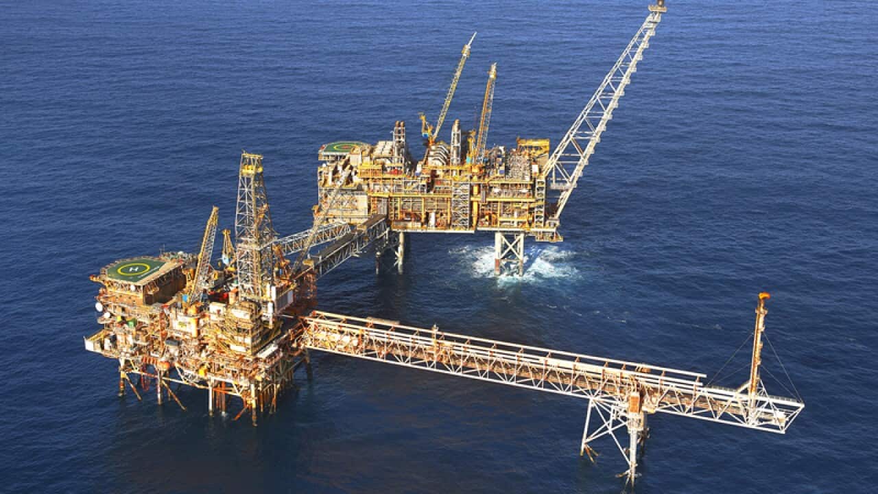 Shareholders arrive for the Woodside Petroleum General Meeting