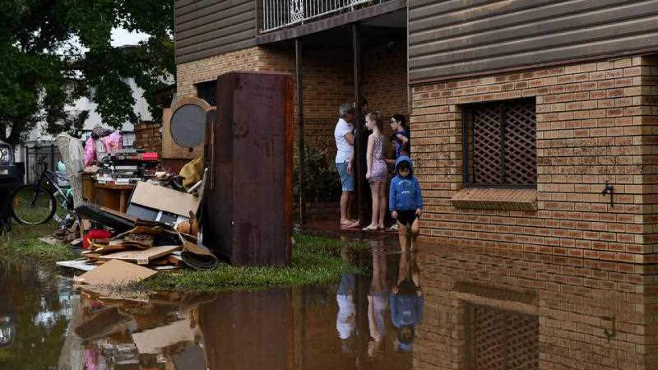 Residents return to their properties as floodwaters recede in Lismore, New South Wales