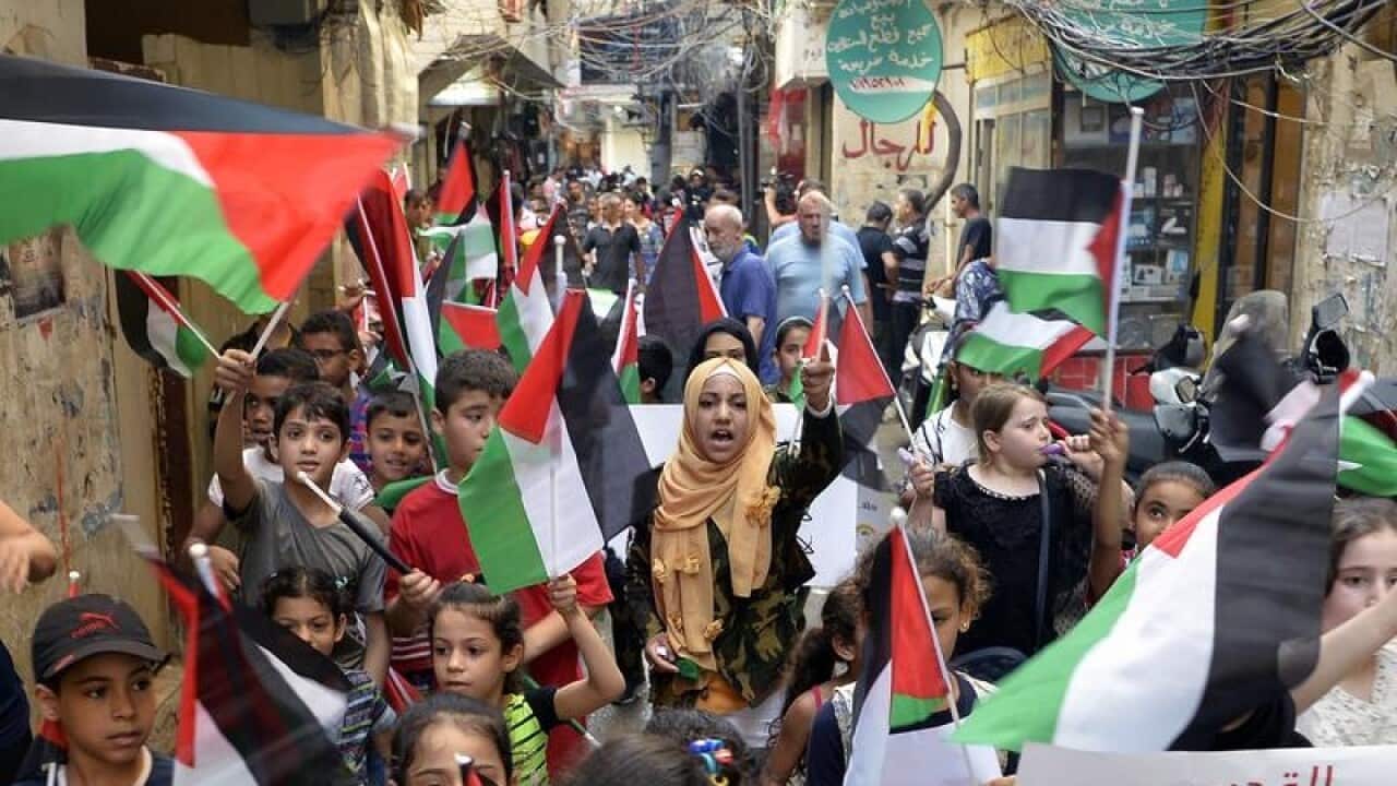 Palestinian children in Lebanon protest against the Bahrain conference