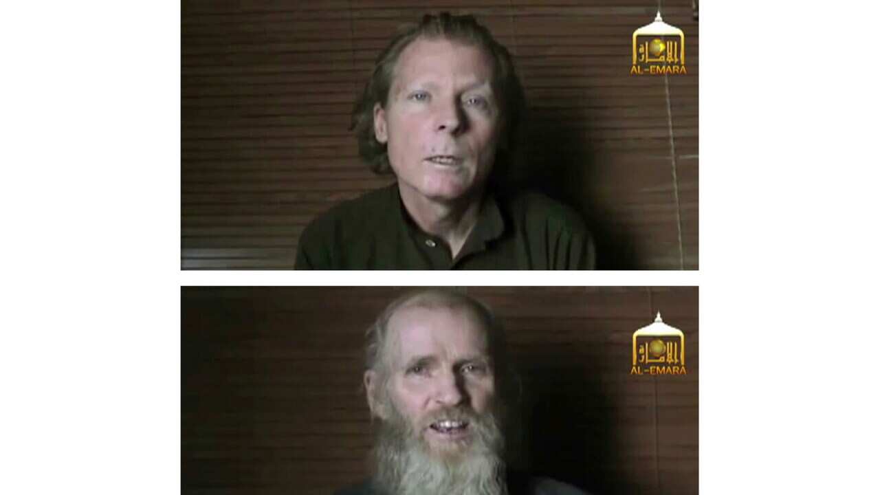 Screenshot from 2017 Taliban video shows kidnapped teachers Australian Timothy Weeks ( top) and American Kevin King