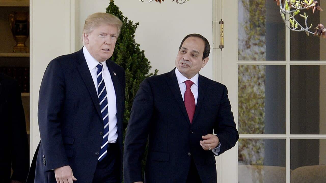 epa05886542 US President Donald J. Trump (L) and President Abdel Fattah Al Sisi of Egypt leave the Oval Office of White House to walk to the Residence in Washington, DC, USA, 03 April 2017. EPA/Olivier Douliery / POOL