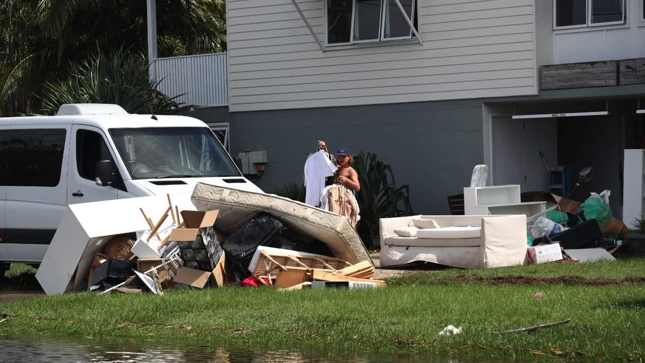 Residents in Byron Bay survey the damage from the latest flood on 31 March 2022.
