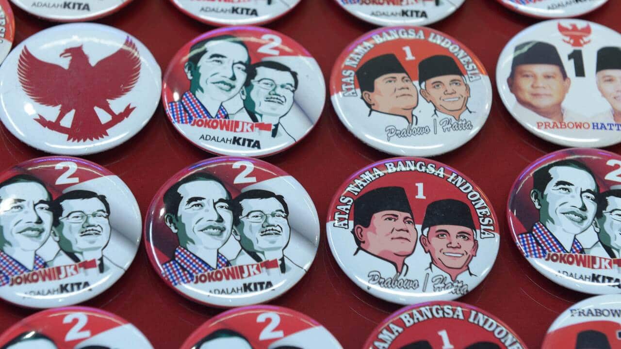 Presidential elections are being contested by anti-corruption outsider Joko Widodo and former general Prabowo Subianto. (AAP)